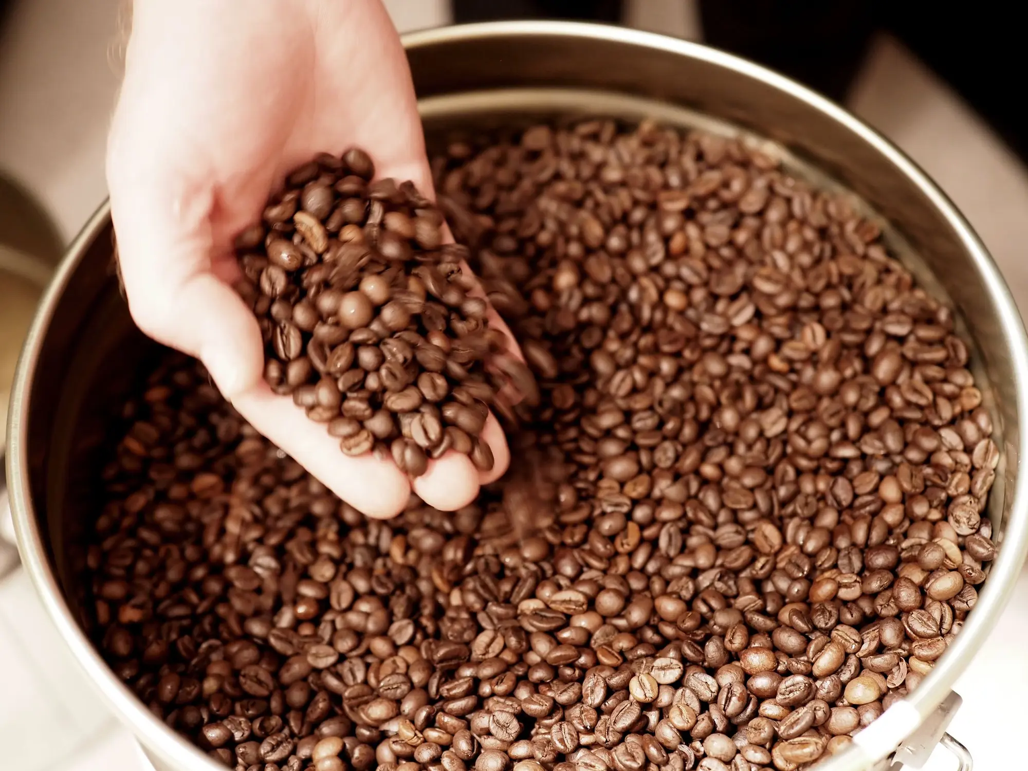Roasted coffee beans in the in-house coffee roastery (c) photo Platzhirsch Kufstein