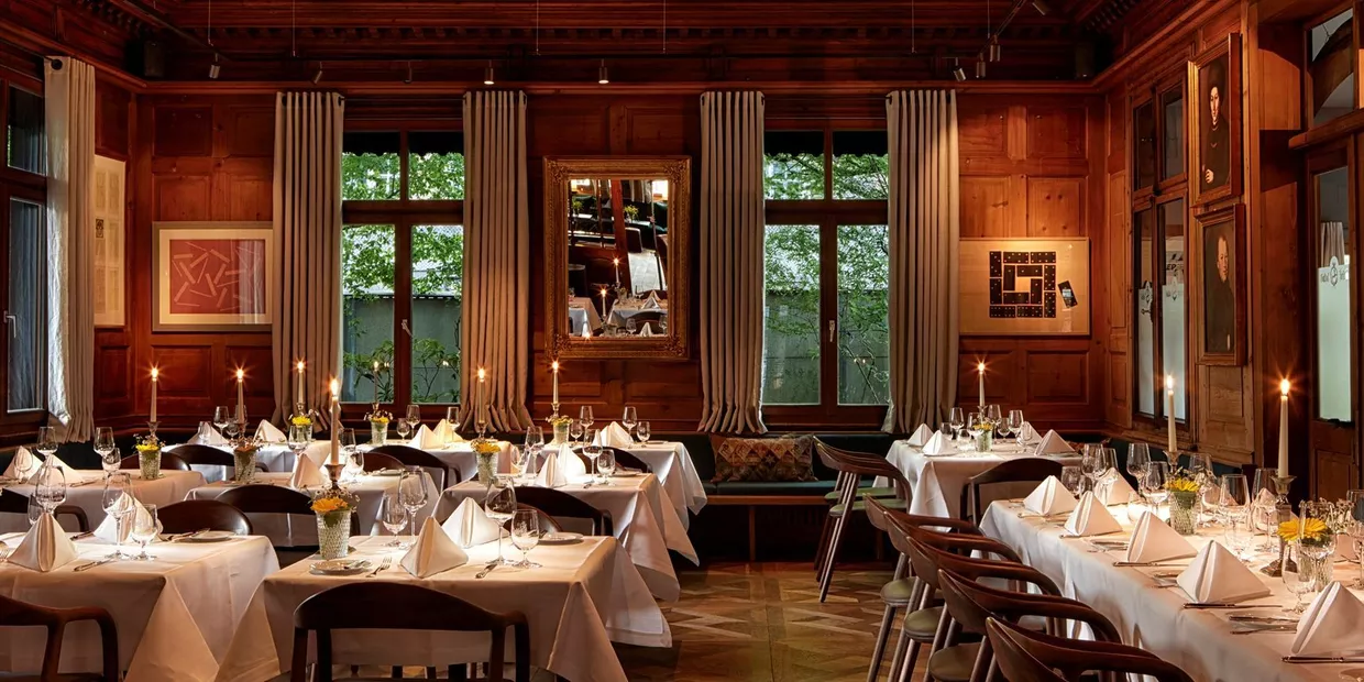 Wood-paneled dining room in the restaurant at Hotel Hirschen in Schwarzenberg, Bregenzerwald (c) photo Adolf Bereuter