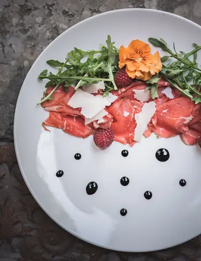 Appetizer plate with cured ham and arugula salad at Schloss Hotel Korb (c) photo Konistudios